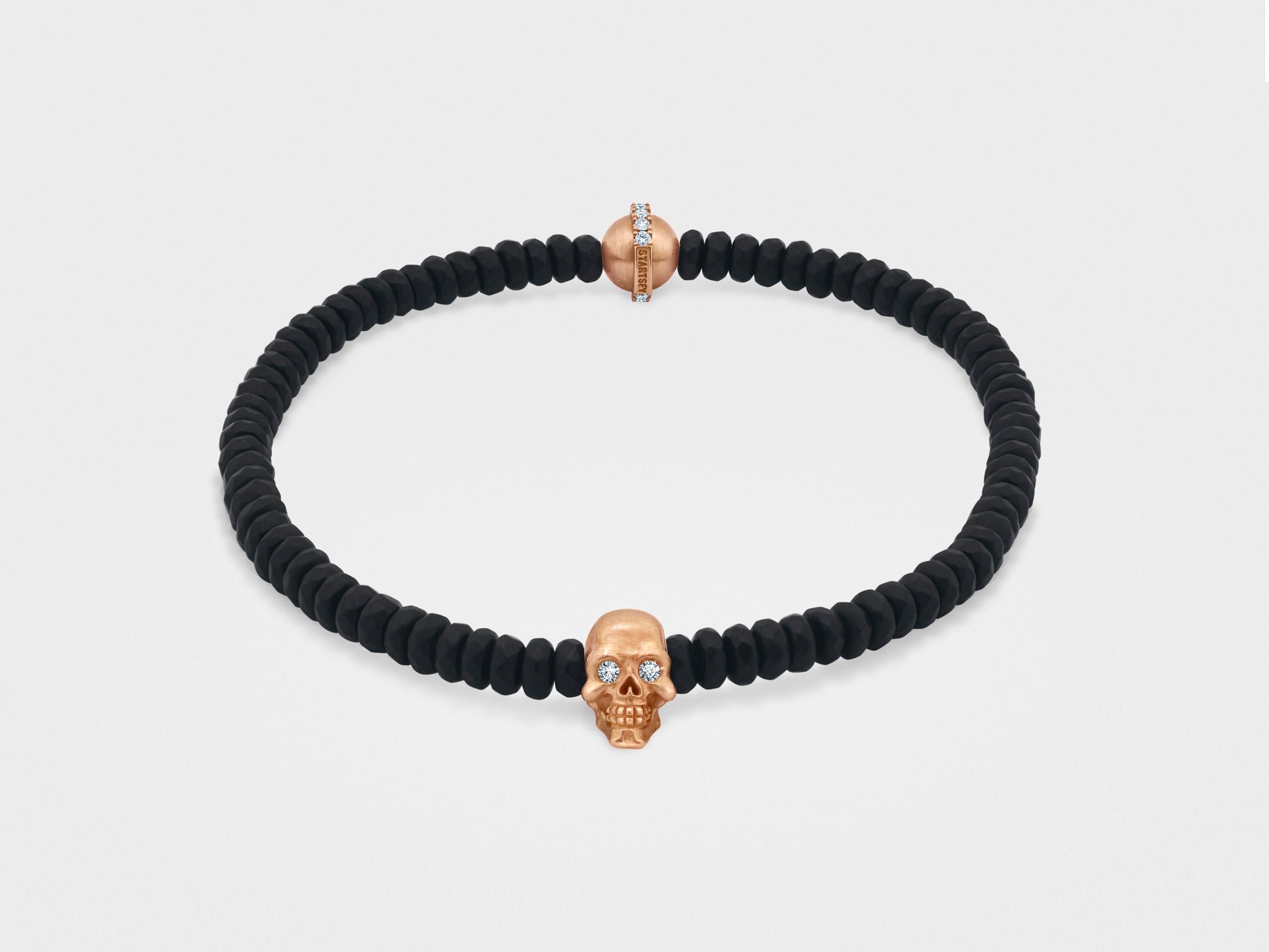 Totenkopf-Armband mit schwarzer facettierter Perle